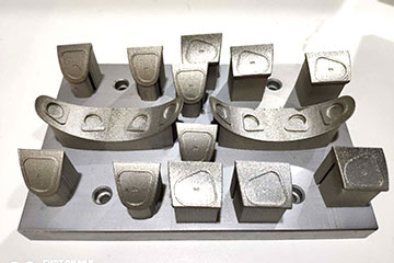 Metal 3D-printed dental molds made by DT's SLM printers