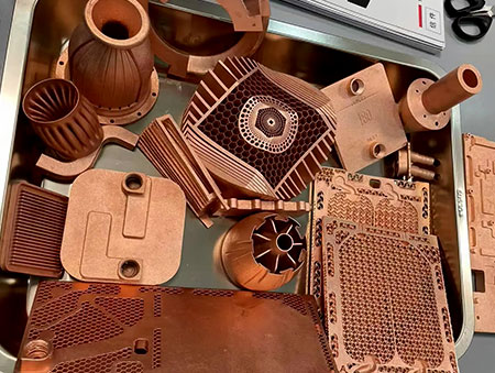 Various SLM 3D printed copper thermal components, lattice cold plates, swirl cooling inserts, fin heat sinks